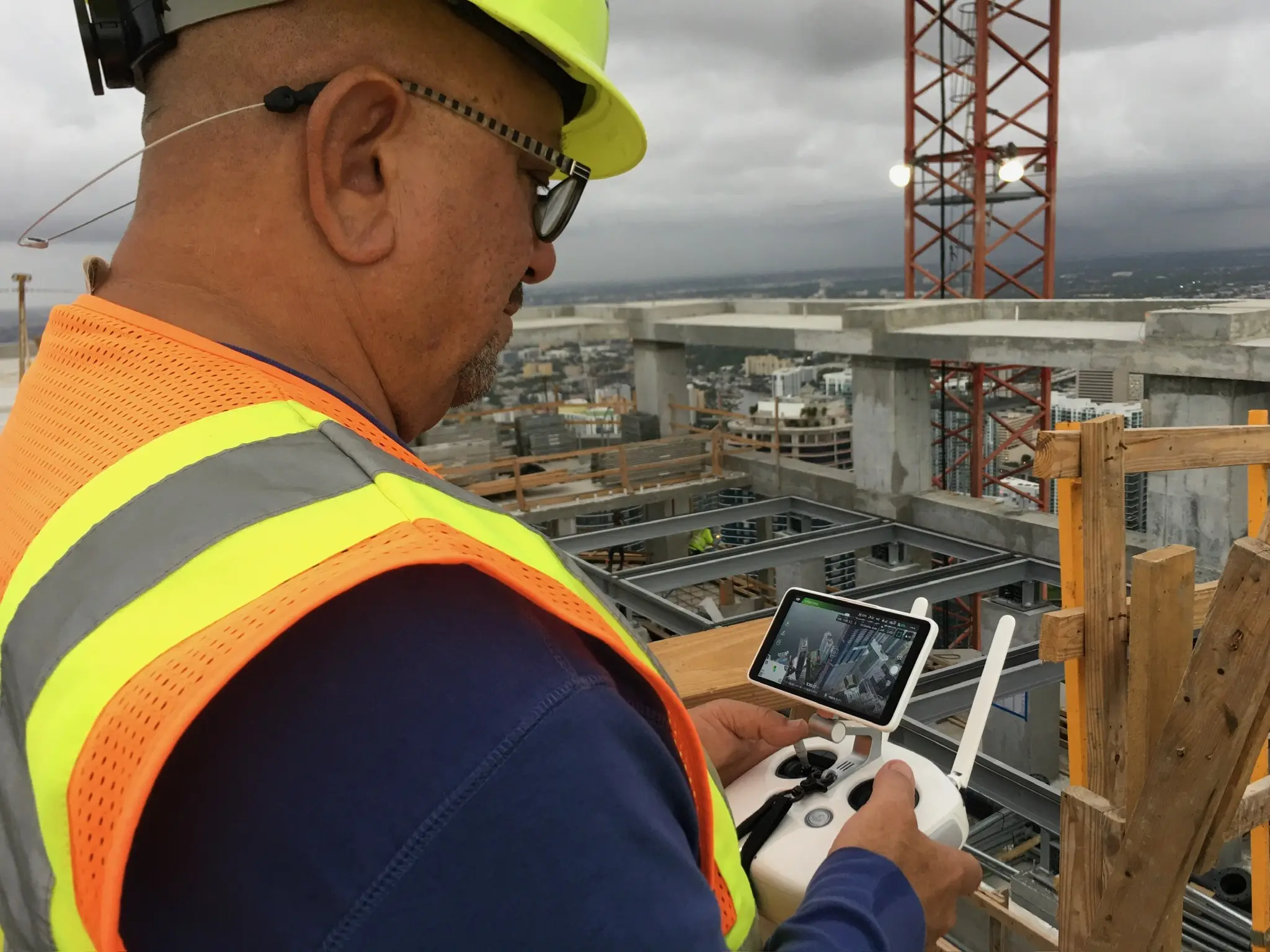 FAA licensed drone pilot performing a building inspection at a Miami jobsite